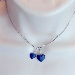 Elegant Silvertone Necklace with Blue Heart Charms